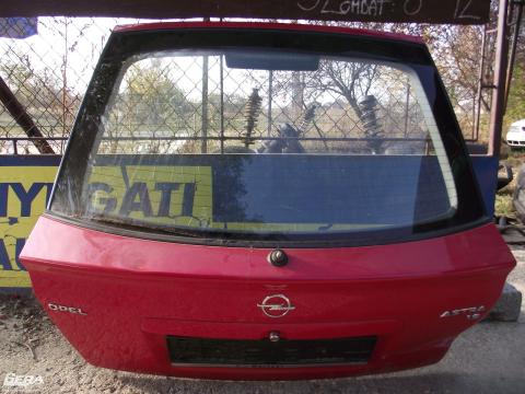 Opel Astra G csomagtérajtó!Piros színű!3 ajtós!Horpadás van rajta...
