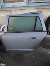 Opel Astra H kombi ajtó! Bal hátsó, szürke!Az ajtó ára a csupasz...