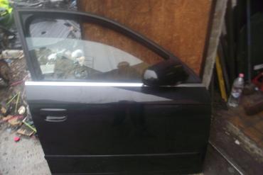 Audi A4 B7 '2006' jobb első ajtó! Fekete színű! Az ár a csupasz...